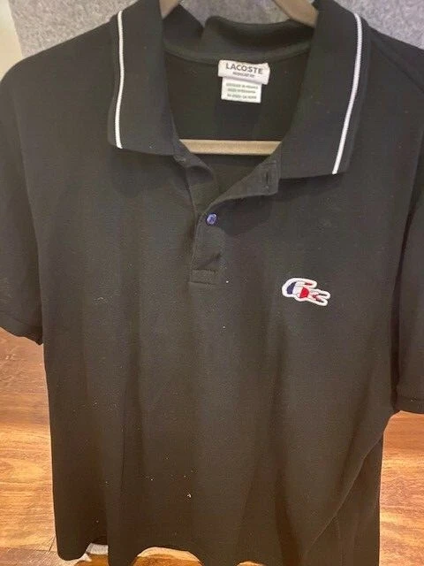 Black and red lacoste best sale shirt