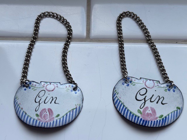Two 19th cent. French hand-painted enameled copper decanter tags labeled "Gin"
