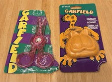 Borrador de hidromiel en forma de cabeza Garfield patas mordida de aprobación y tijeras