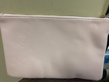 Women NWOT "Daisy Marc Jacobs" pink zipper make up bag.