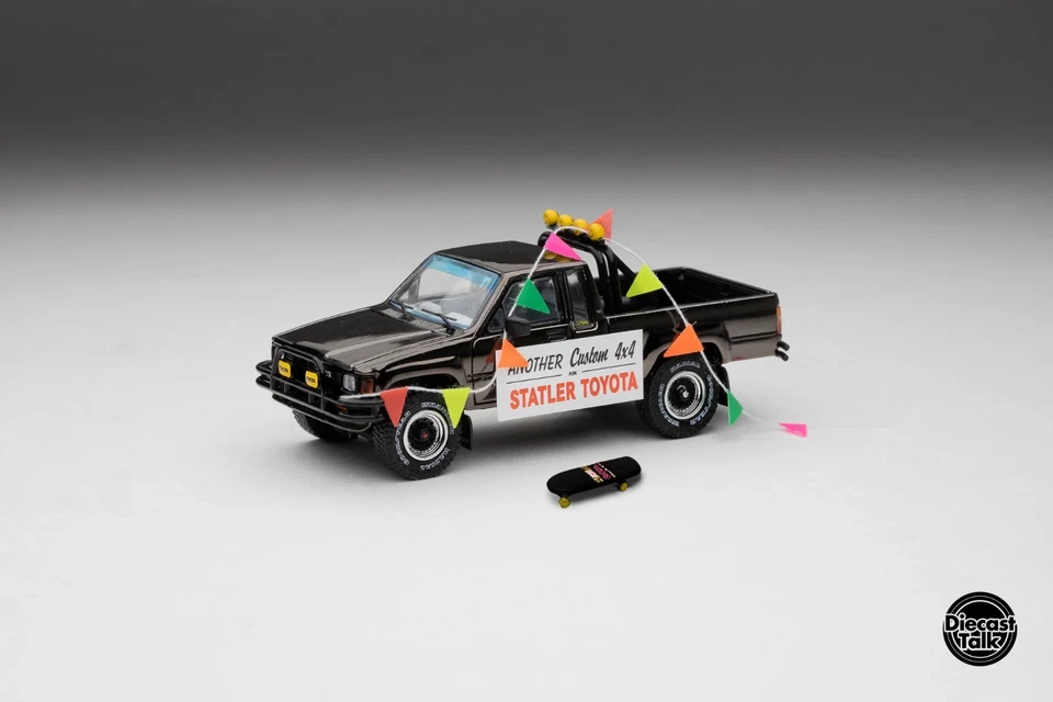 DiecastTalk MDX Exclusive 1/64 Toyota 1985 Hilux SR5 4x4 Black Chrome Black Skat - Image 2 of 4