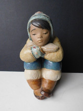 FIGURA PORCELLANA GRES LLADRO ESCHIMESE SEDUTO CON CUFFIA 1983?