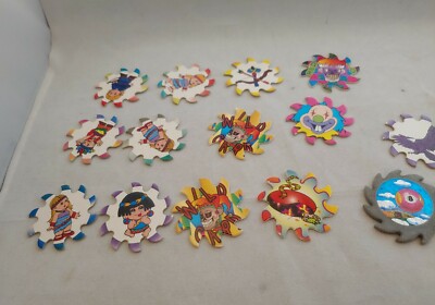 Multi- Theme Saw Blade Pogs Caps From 1990's - lot of 14 with a  Metal  slammer