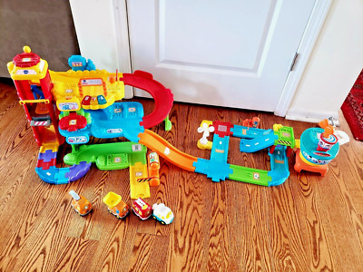 Vtech Go Go Smart Wheels Park & Learn Deluxe Garage & Airport Playsets w 4 cars