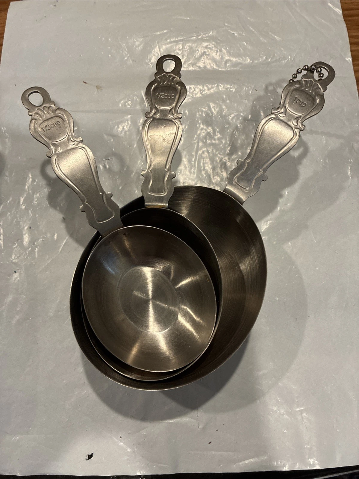 NORDIC WARE METAL MEASURING SPOONS / One Cup, Half A Cup, Third Of A Cup