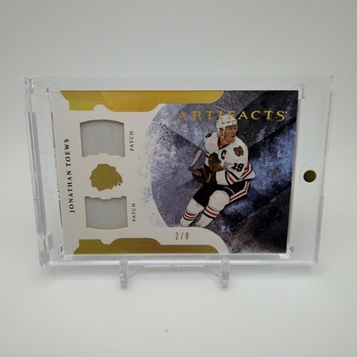Jonathan Toews 2011-12 Artifacts Dual Patch #19 Gold Spectrum 2/9 Game Used
