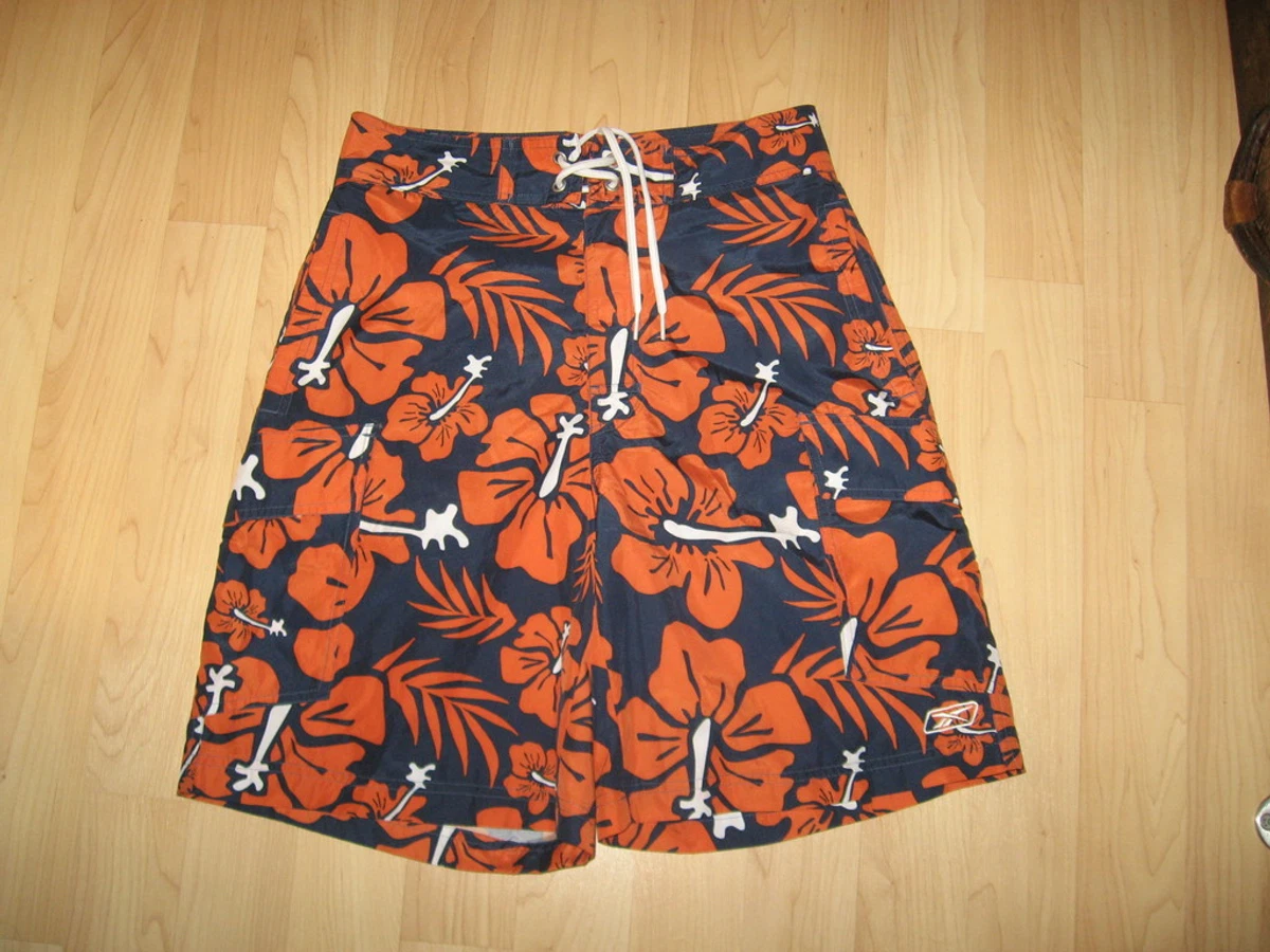 Reebok on sale shorts orange