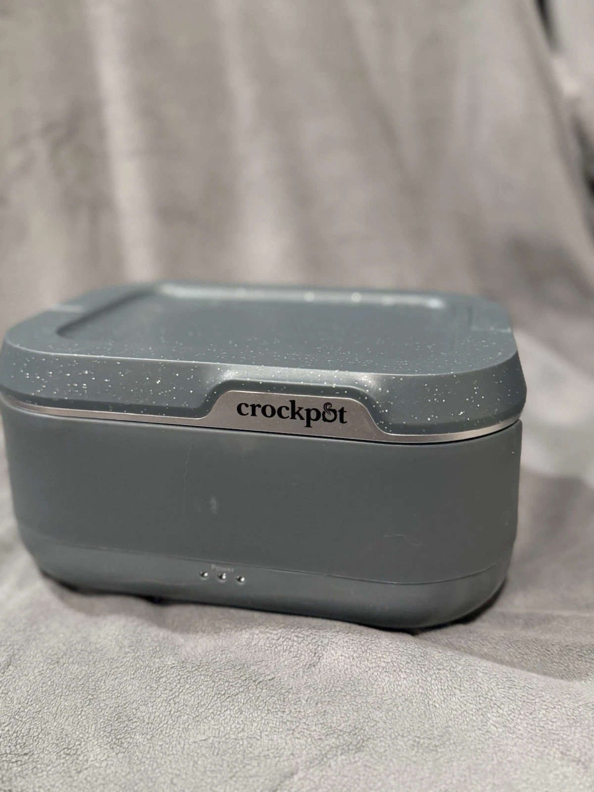 Portable Crockpot Sunbeam Products SPSCW31-B With Unlabeled Thermos.