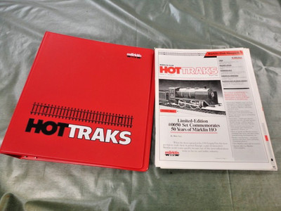 Marklin Hot Traks binder with many old Hot Traks pamphlets  in English   nice!