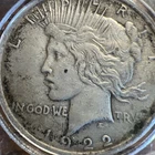 1922  Peace US Silver Dollar, F-VF condition, circulated. Some Toning.