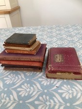 collection of antique miniature books as shown
