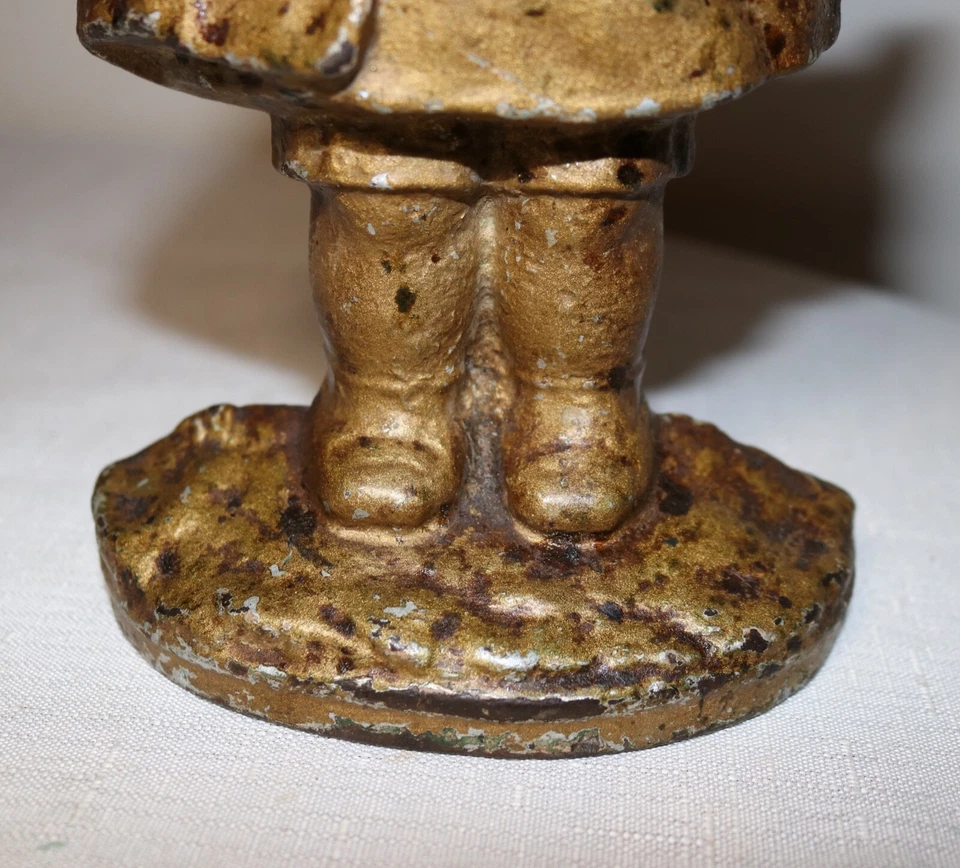 rara niña antigua de hierro fundido sólido de finales de 1800 con cesta pesada figura tope de puerta Foto 4 de 4