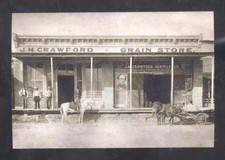 REAL PHOTO COLEMAN TEXAS DOWNTOWN CRAWFORD GRAIN STORE POSTCARD COPY