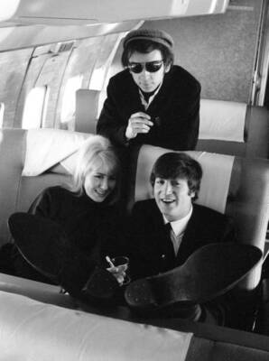 John Lennon with his wife Cynthia on the plane 1964 Old Photo