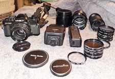 Minolta X-700 35mm SLR Film Camera Lot Motor Drive 1 Vivitar Lenses Flash Tripod