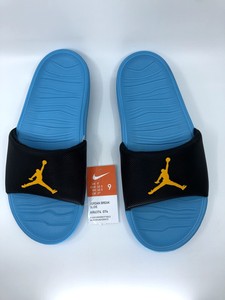 blue gold nike slides