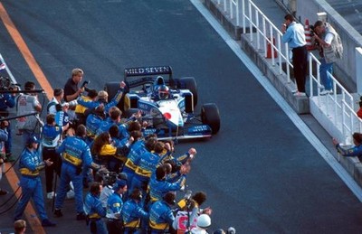 Winner Michael Schumacher Benetton B195 is greeted by his pit- 1995 Old Photo