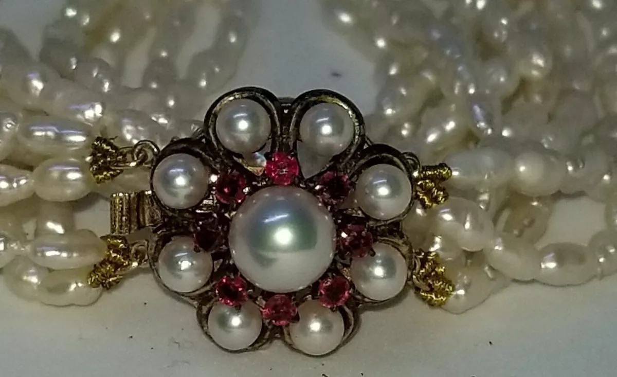 Sold at Auction: VINTAGE PEARL NECKLACES WITH 14KT GOLD CLASPS