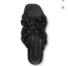 This is a Vionic Kalina women's slide sandal in black with a braided crisscross