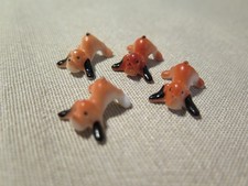 4 tiny vintage puppy miniature celluloid plastic figurines - Japan or U.S.A.
