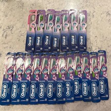 Bulk lot Of 19 Packs of Oral-B Toothbrushes Extra soft, Soft, And Medium