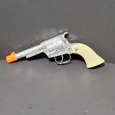 Vintage Chinese Diecast Cowboy Toy Cap Revolver Silver Cream Orange Tip