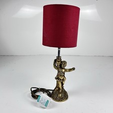 Vintage sculptural Gilded cherub lamp, red shade working pat tested 40cm tall
