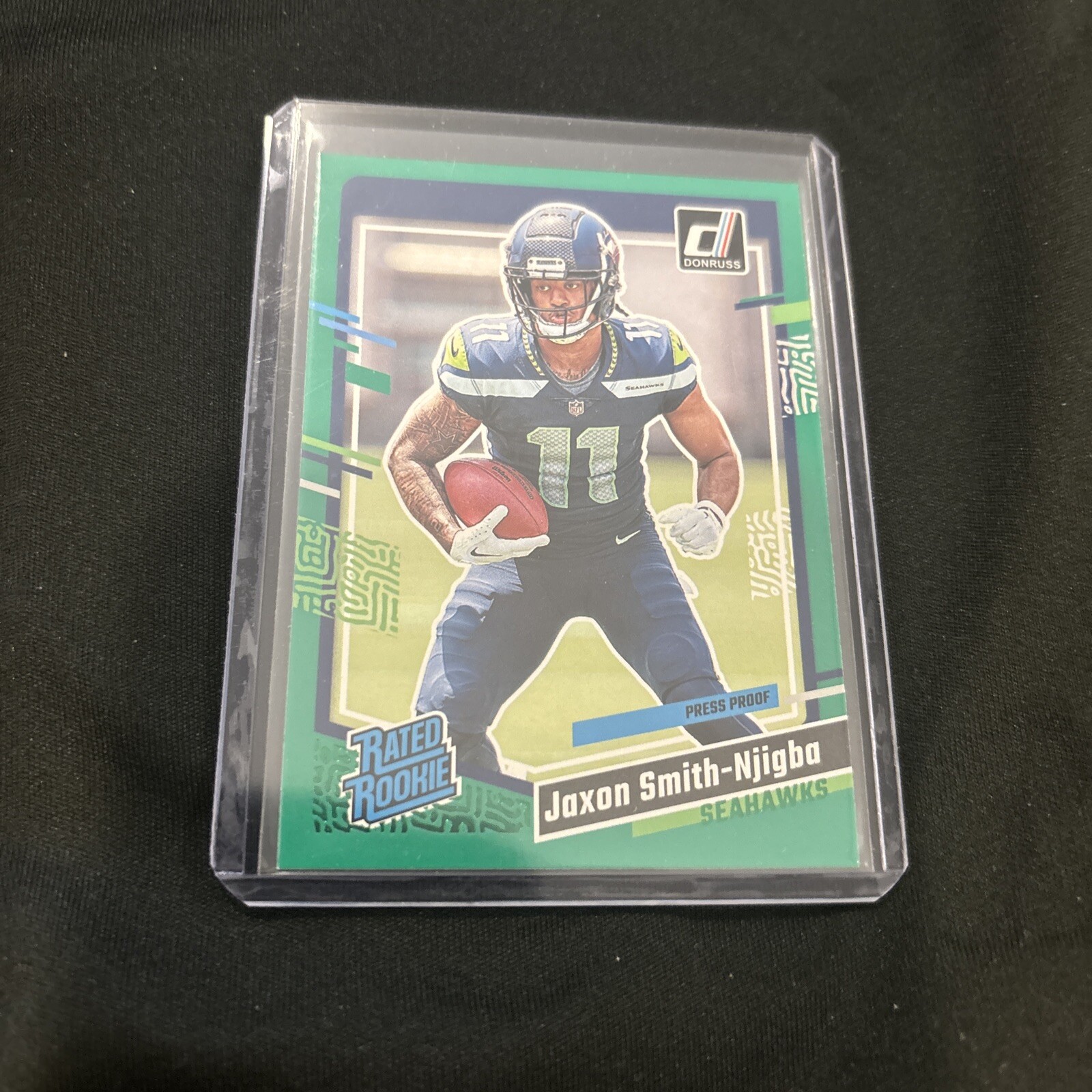 2023 Donruss #390 Jaxon Smith-Njigba Green Press Proof Rated Rookie