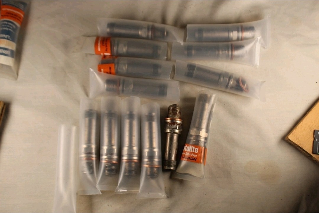 13 Autolite URHB37E spark plugs installed but never run.  Open package B3