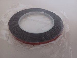 Rubber Sheething Strip 1/16"thick X 1/4" wide X 10' PSA Adhesive On One Side.