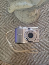 Canon PowerShot A1100 IS 12.1 MP Digital Camera - Silver BATTERY COVER BROKEN