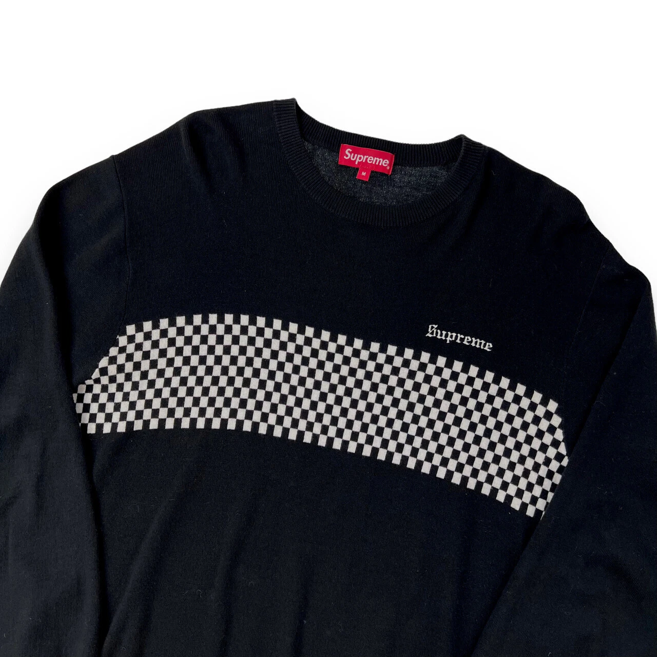Pull à carreaux Supreme