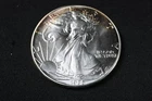 NobleSpirit GEM BU 1986 American SILVER Eagle .999 Fine Some Toning
