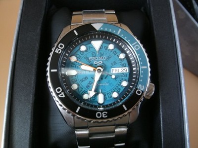 Seiko 4R36-13N0 watch working and keeping time. Blue See-thru dia. Box and card.