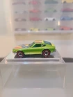 Near Mint 1976 Hot Wheels Redline Datsun Z Whiz Green.  Made in Hong Kong.