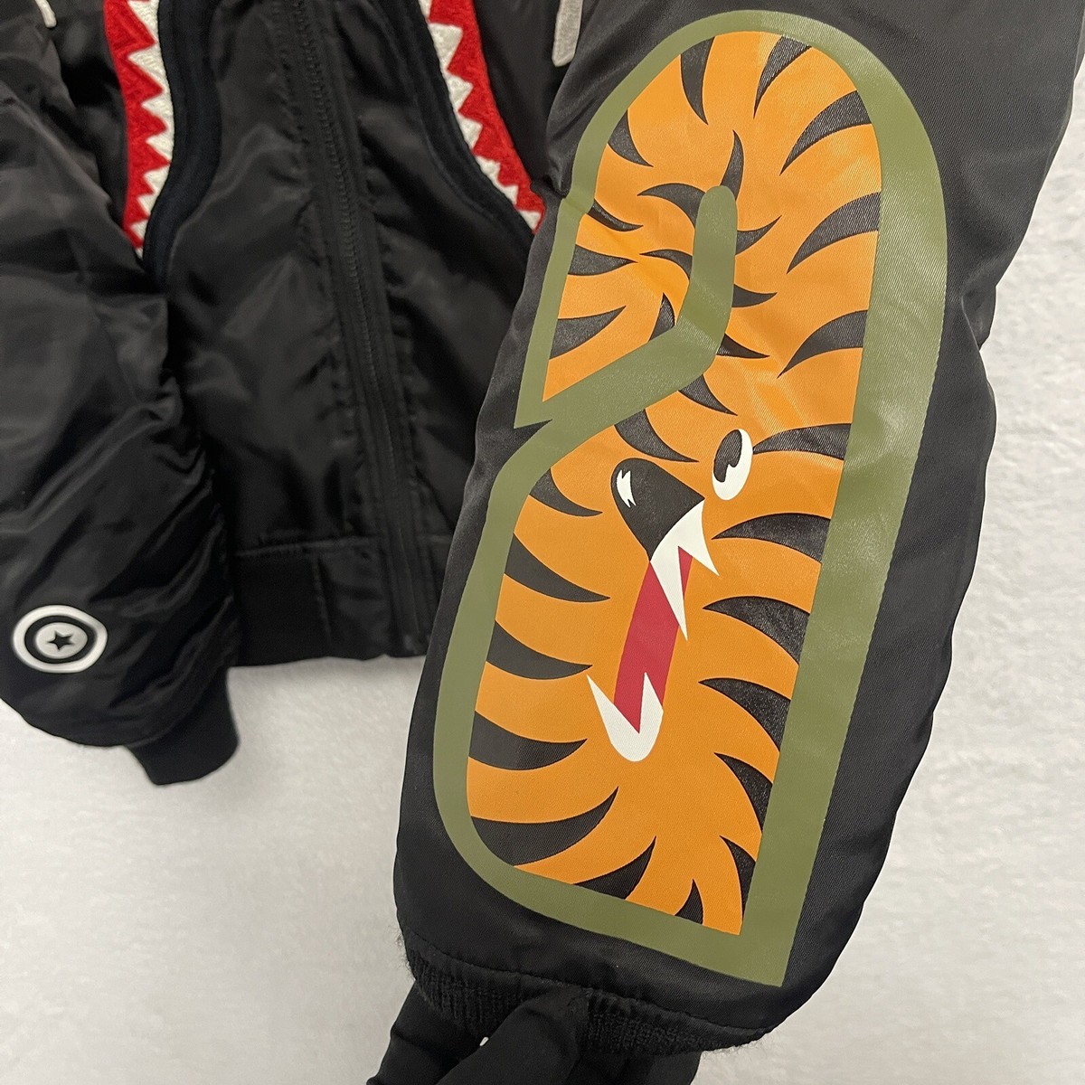 A Bathing Ape BAPE Nylon MA-1 Shark Embroidered Bomber A Bathing Ape BAPE Nylon MA-1 Shark Embroidered Bomber