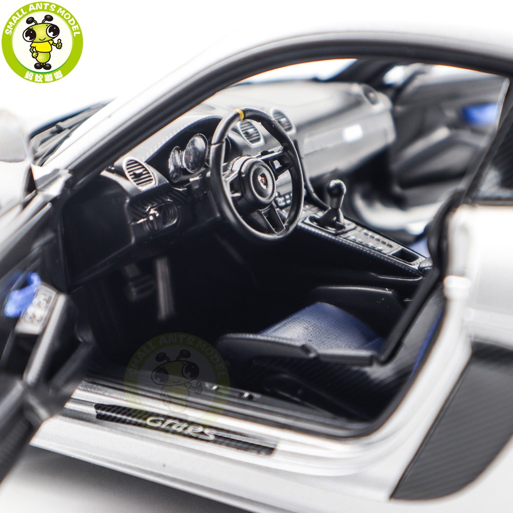 Modèle Réduit Porsche Cayman GT4 RS Weissach Pack 1:18 Par Norev - Blanc/Indigo - Exclusivité ASIA