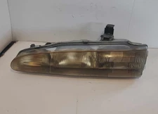 1992 ECLIPSE LH HEAD LIGHT ASSEMBLY *CLOUDY* USED OEM