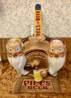 Vintage Piel's Metal Beer Gnome Barrel Bar Display Beer Foam Scraper Holder