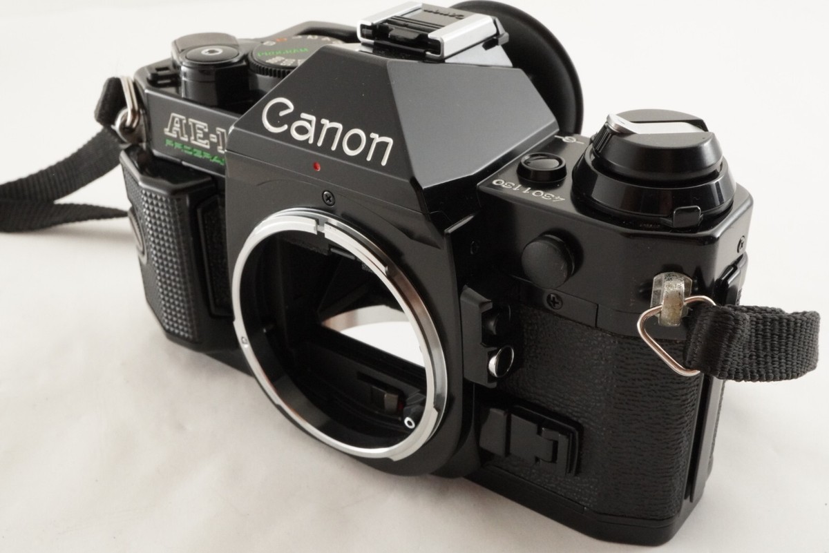 Canon AE-1 PROGRAM Black + New FD 50mm F1.8 +Macro50mm+100 Canon AE-1 PROGRAM Black + New FD 50mm F1.8 +Macro50mm+100