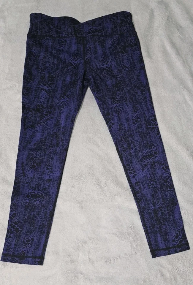 Leggings Kirkland Signature púrpura negro para mujer grandes pantalones elásticos de yoga Foto 3 de 4