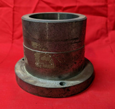 UNBRANDED FLANGED COUPLING OUTSIDE DIAMETER: 6-1/4" LENGTH: 4-3/4"