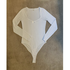 Women s White Solid Long Sleeve One-Piece Bodysuit, Button Accent, Size M
