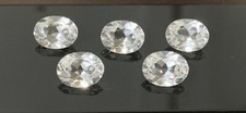 5 PCS. MACHINE CUT OVAL 9x7 MM. WHITE SAPPHIRE LAB CORUNDUM