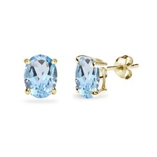 Gold Flashed Sterling Silver Blue Topaz 8x6mm Oval-Cut Solitaire Stud Earrings