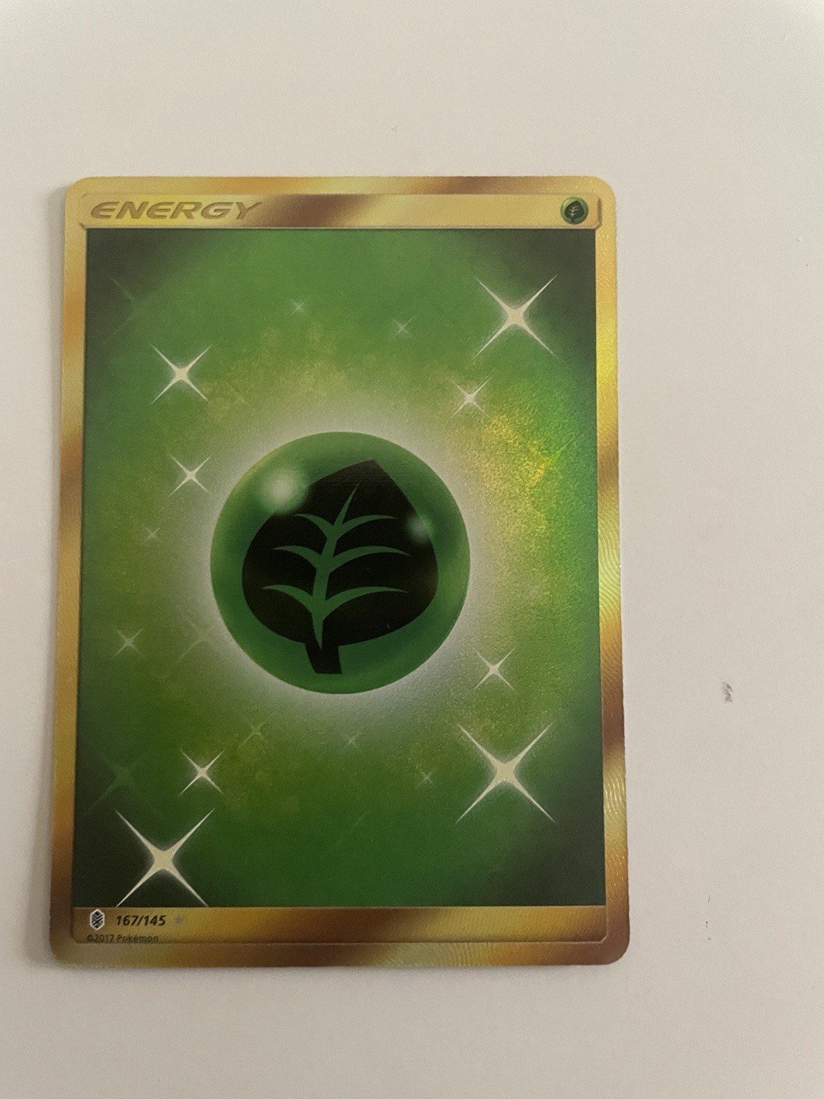 Pokemon - Grass Energy (Secret) 167/145 Sm-Guardians Rising Holo - NM