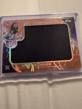 Topps 2025 Universe WWE Ringside Relics Memorabilia Roman Reigns /25