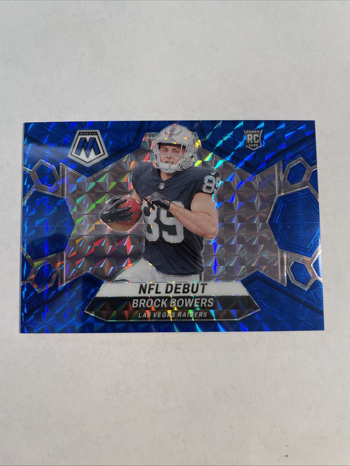 2024 Mosaic Brock Bowers RC Blue Prizm NFL Debut /99 #286 Vegas Raiders