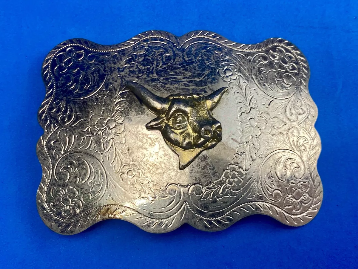 Cattle belt buckles top