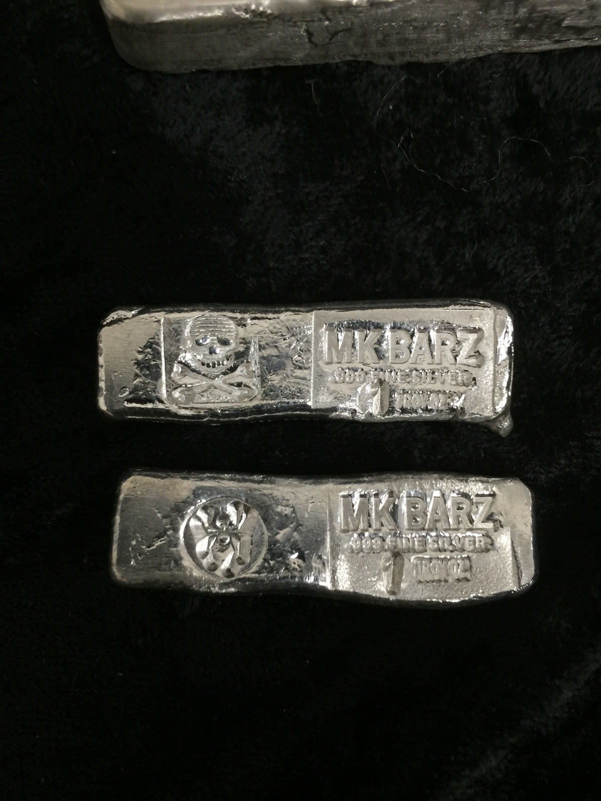 Buy 1 oz MK Barz Hand Poured Map Skull Silver Rounds l JM Bullion